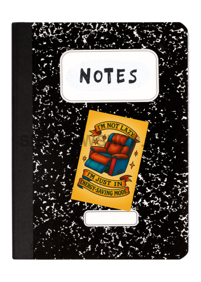 Notebook with a sticker on the cover displaying text and graphics.