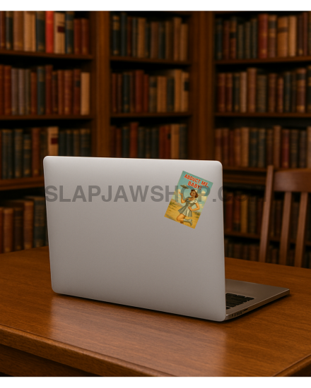 Laptop on a wooden desk with bookshelves in the background