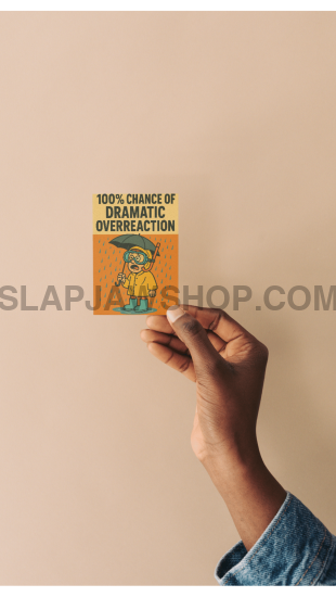 Hand holding a small card with text and an illustration on a beige background