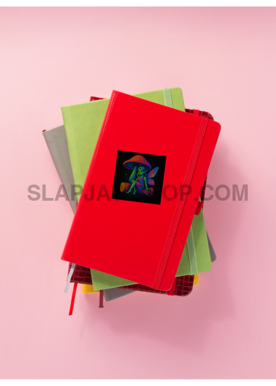 Stack of colorful books on a pink background