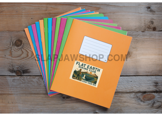 Colorful notebooks with a 'Flat Earth Hiking Club' label on a wooden surface