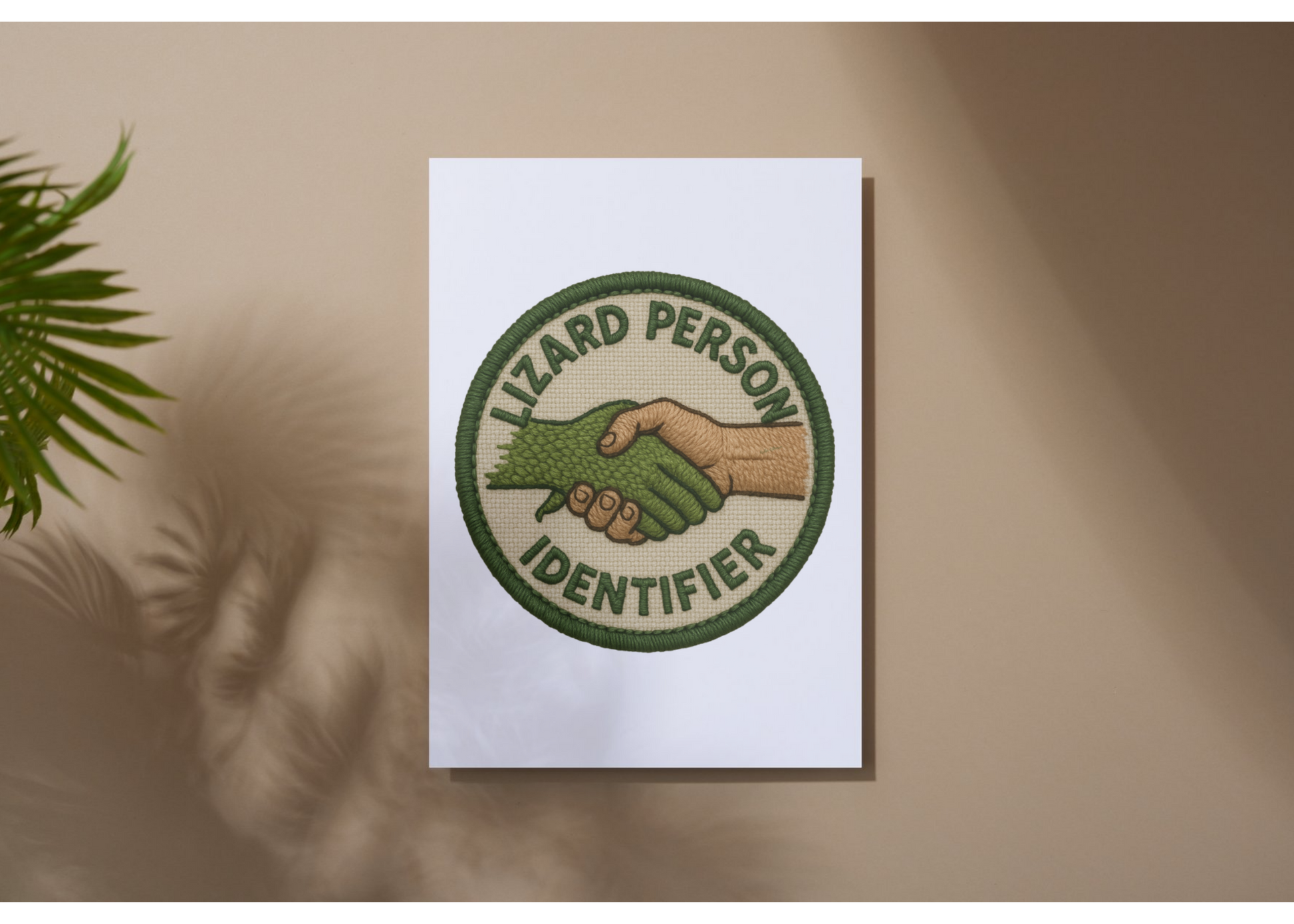 Card with a green and brown emblem on a white background, placed on a textured surface with a plant in the corner.