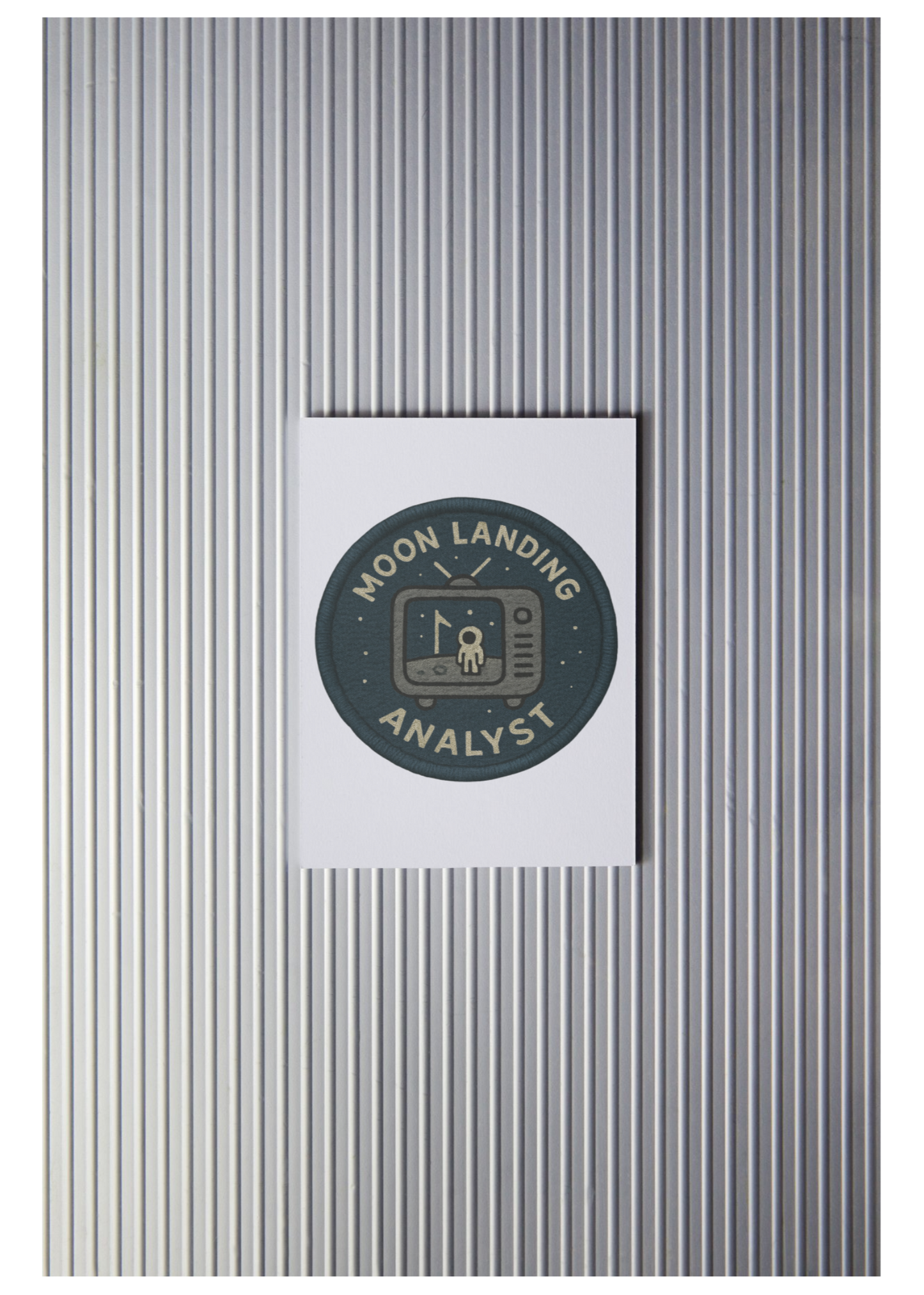 Metallic textured surface with a circular logo and text in the center