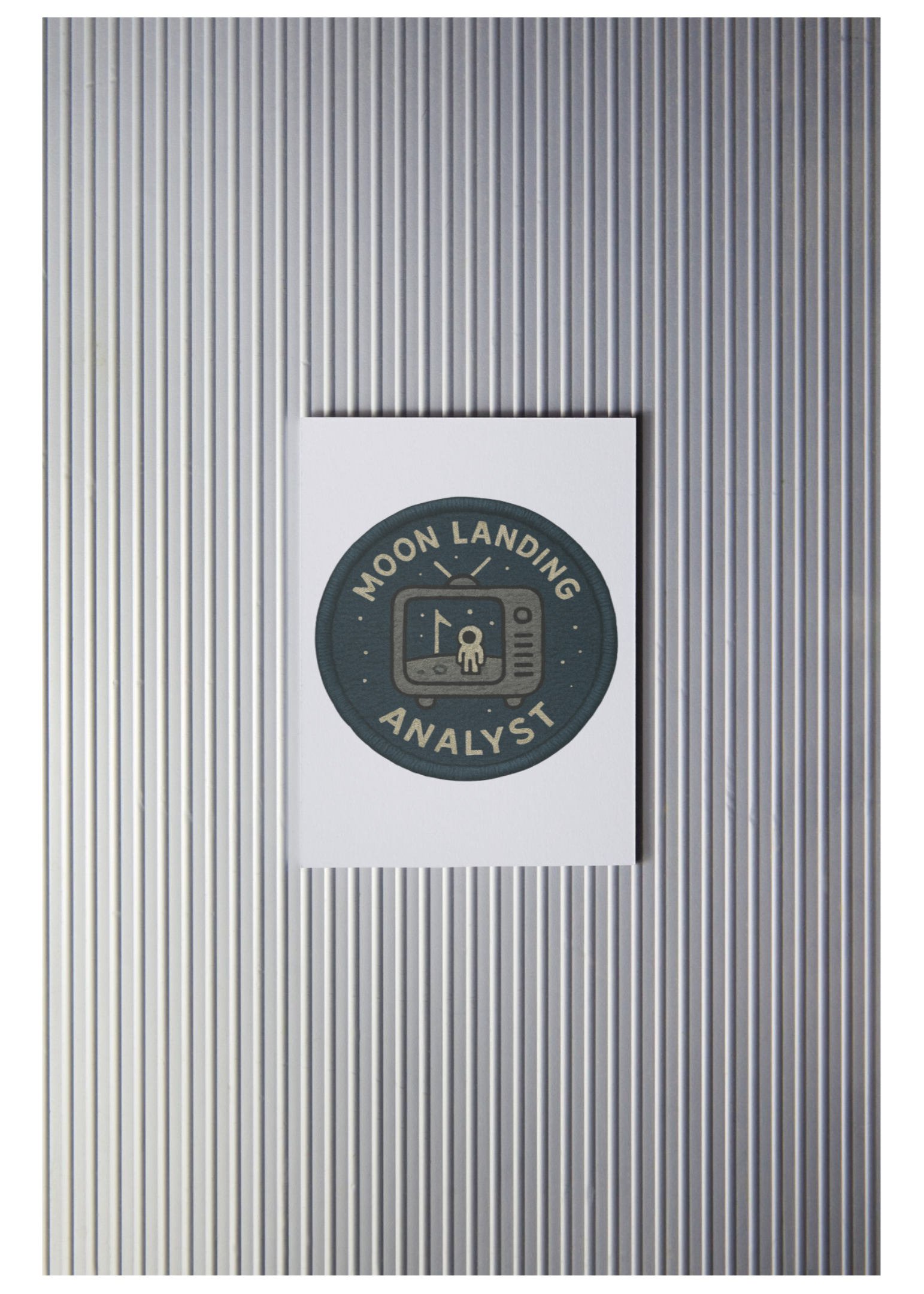 Metallic textured surface with a circular logo and text in the center