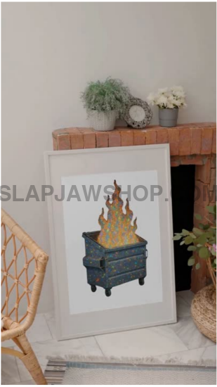 Framed artwork of a fireplace in a room with a chair and decorative items.