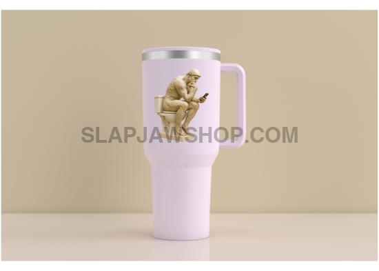 White travel mug with a gold statue on a beige background