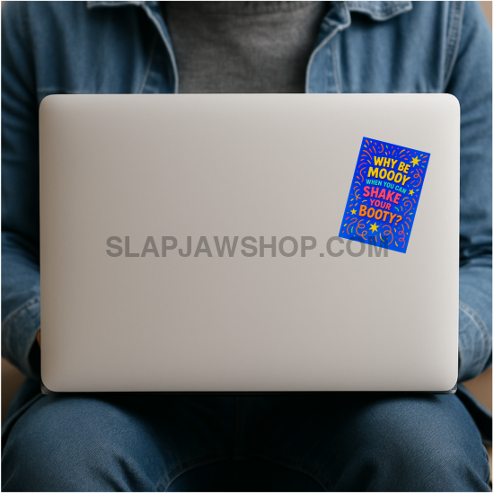 Person using a laptop with a sticker on the cover